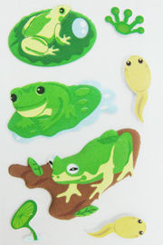 El PVC borroso suave embroma la forma verde clara Eco de la rana de la historieta de las etiquetas engomadas hinchadas amistoso